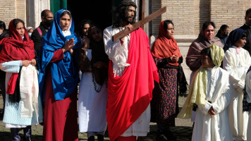The people of Kerala, India resident in Italy commemorate the Holy Week with prayers and depiction of crucification of Jesus Christ on April 10, 2022 in Rome, Italy.
