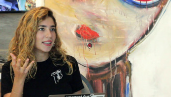 Nour Milhem, Palestinian designer and artivist.