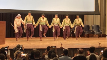 A dabka troupe performs at the opening ceremony of the Palestine Writes Literature Festival. [Brooke Anderson/The New Arab]