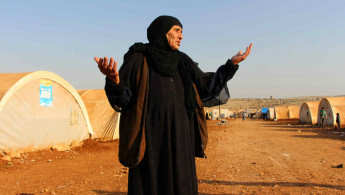 Displaced Syrian woman in Idlib AFP