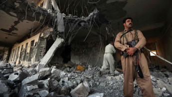 KDPI member inspects Iran bomb damage AFP