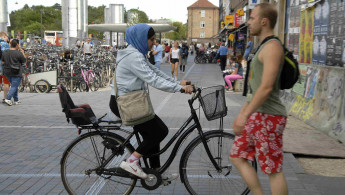 Muslim cycling girl copenhagen getty