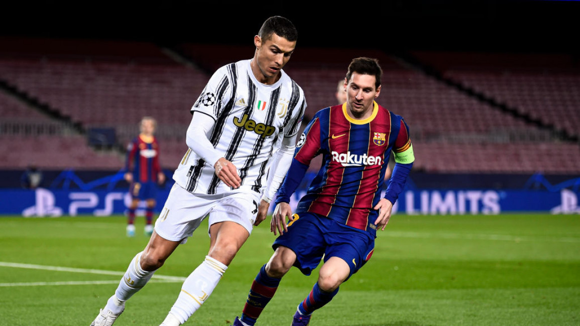 Lionel Messi (right) and Cristiano Ronaldo (left) during a football match