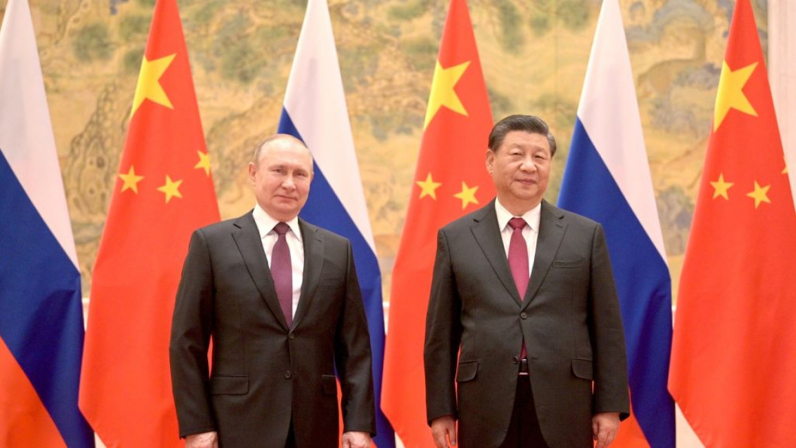 President Vladimir Putin of Russia (left) alongside Chinese leader Xi Jinping (right)