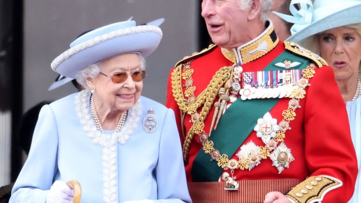 Queen Elizabeth II and Prince Charles at Buckingham Palace.