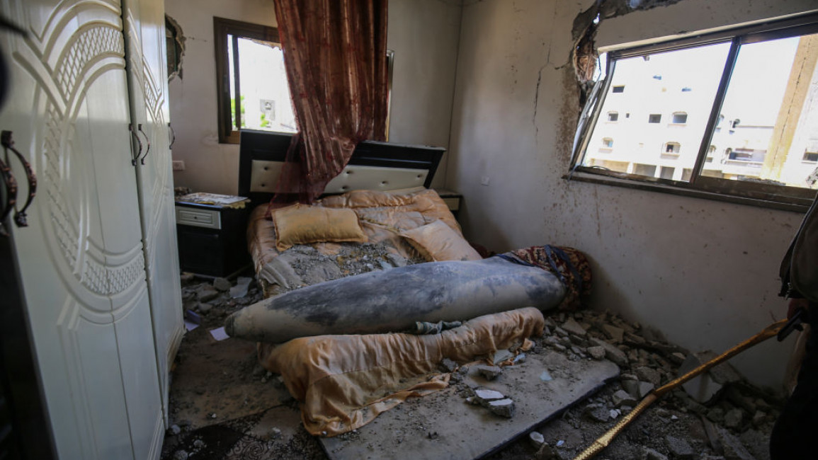 An unexploded Israeli bomb in a Gazan bedroom