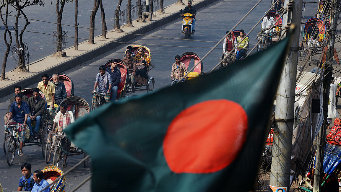 Bangladesh flag above a street