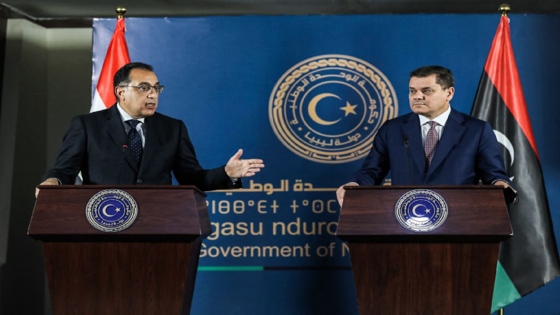 Egyptian (L) and Libyan interim prime ministers