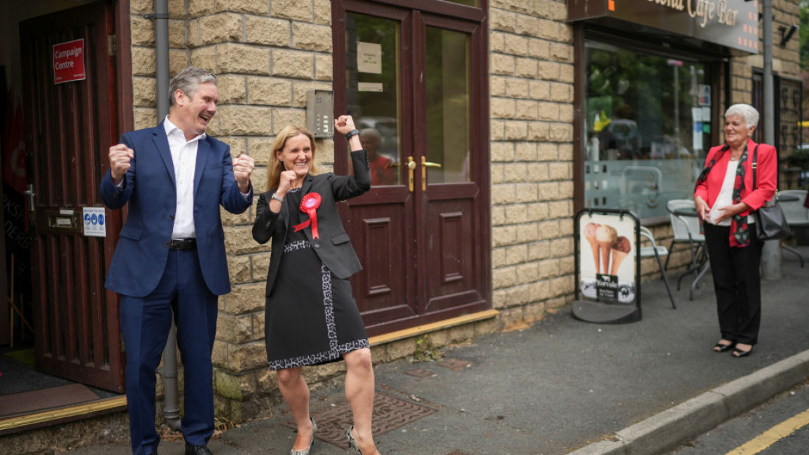 Labour's Kim Leadbeater (M) celebrates her narrow victory in the Batley and Spen by-election with Labour leader Sir Keir Starmer (L) on 2 July, 2021. [Getty]