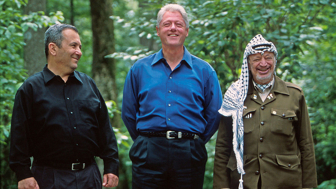 373012 03: U.S. President Bill Clinton laughs with Israeli Prime Minister Ehud Barak (L) and Palestinian President Yasser Arafat (R) July 11, 2000 at Camp David during peace talks. Peace talks between Israel and the Palestinians began in a serious manner and a ''good atmosphere,'' with both sides saying they wanted to tackle the thorny issues quickly. (Photo by Cynthia Johnson/Liaison)