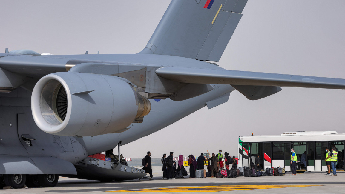 Military transport aircraft carries evacuees from Afghanistan and they arrive at Al-Maktoum International Airport [Getty]