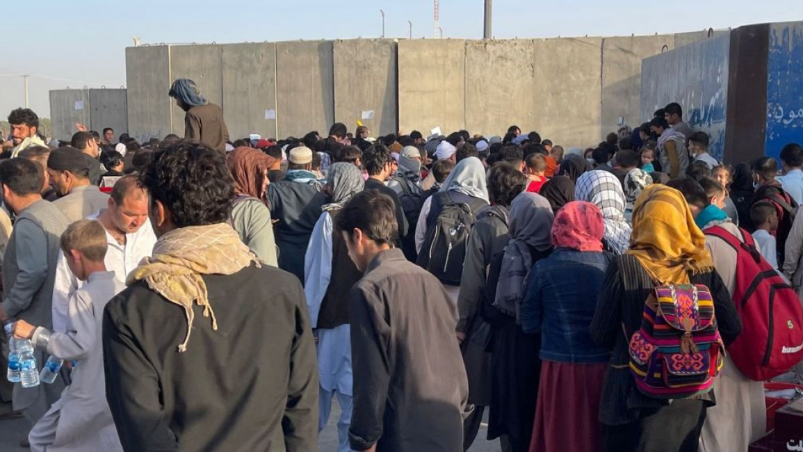 Hundreds of Afghans are waiting to flee the country near Kabul airport [Getty]