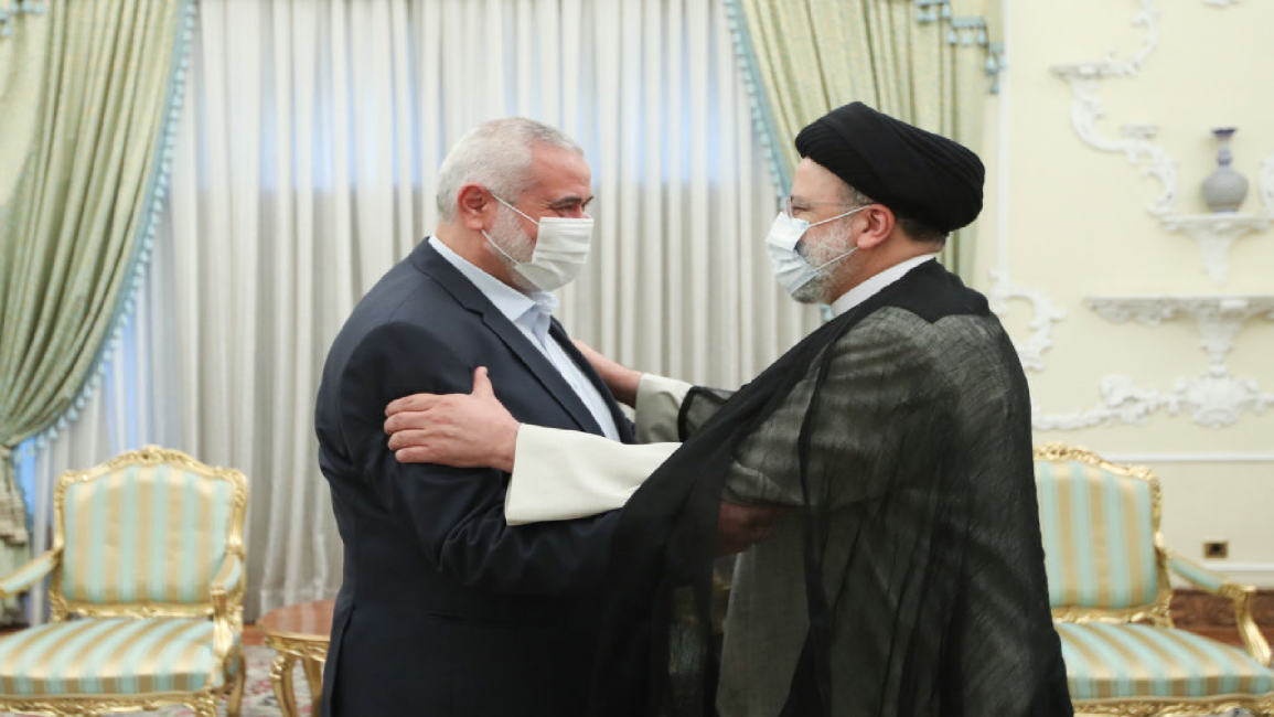 Hamas leader (L) and Iran president
