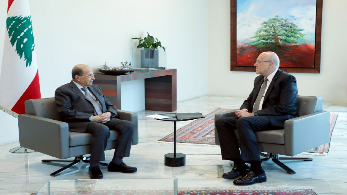 Lebanese president Michel Aoun (L) and PM-designate Najib Miqati