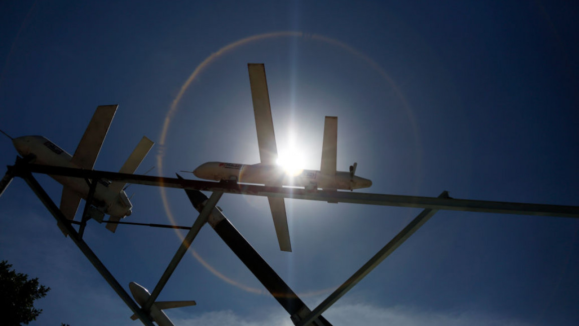 Drones on display against the Sun in Sanaa, Yemen