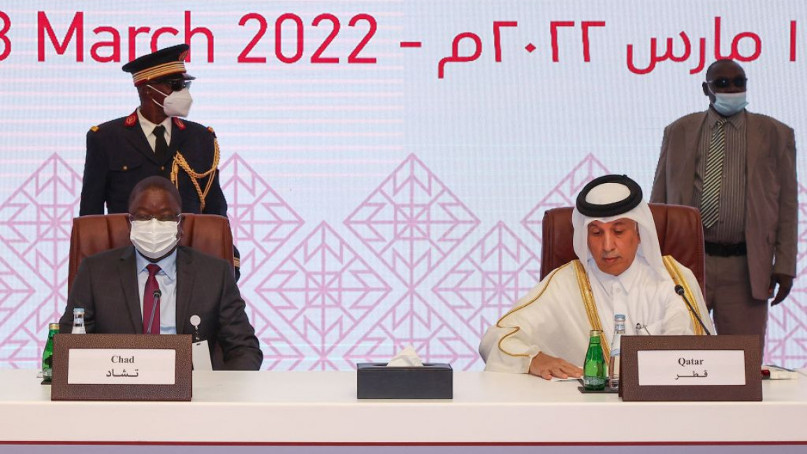 Qatar's foreign minister (right) sits next to Chad's prime minister (left)