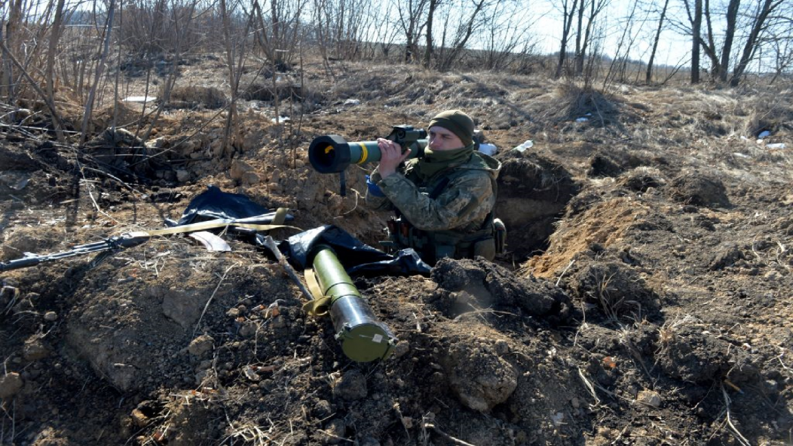 A serviceman of Ukrainian military forces holds a FGM-148 Javelin