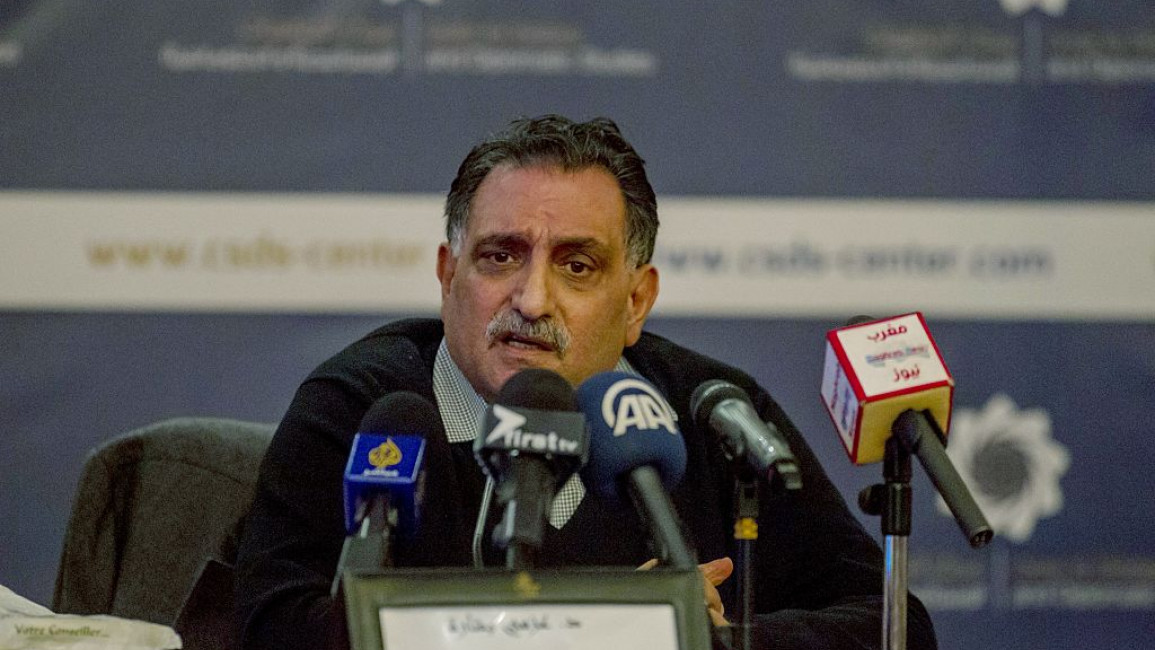 Azmi Bishara (pictured) speaks at a seminar commemorating the sixth anniversary of the Jasmine Revolution in Tunis [Getty Images]