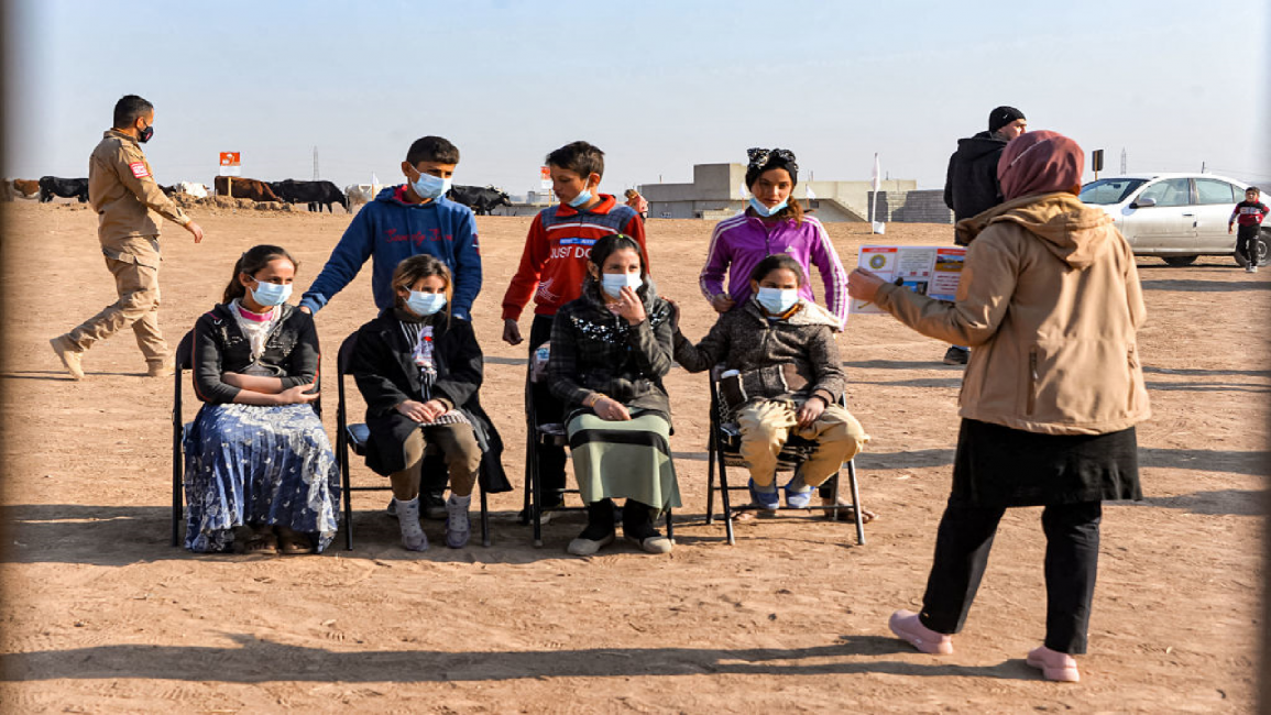 A workshop for children on how to report suspected cases of landmines in Iraq