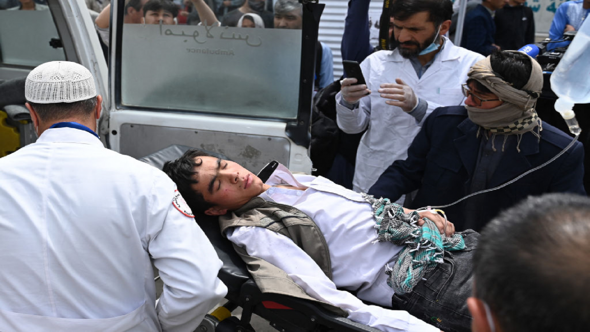 Boy on stretcher in Kabul after school bombings