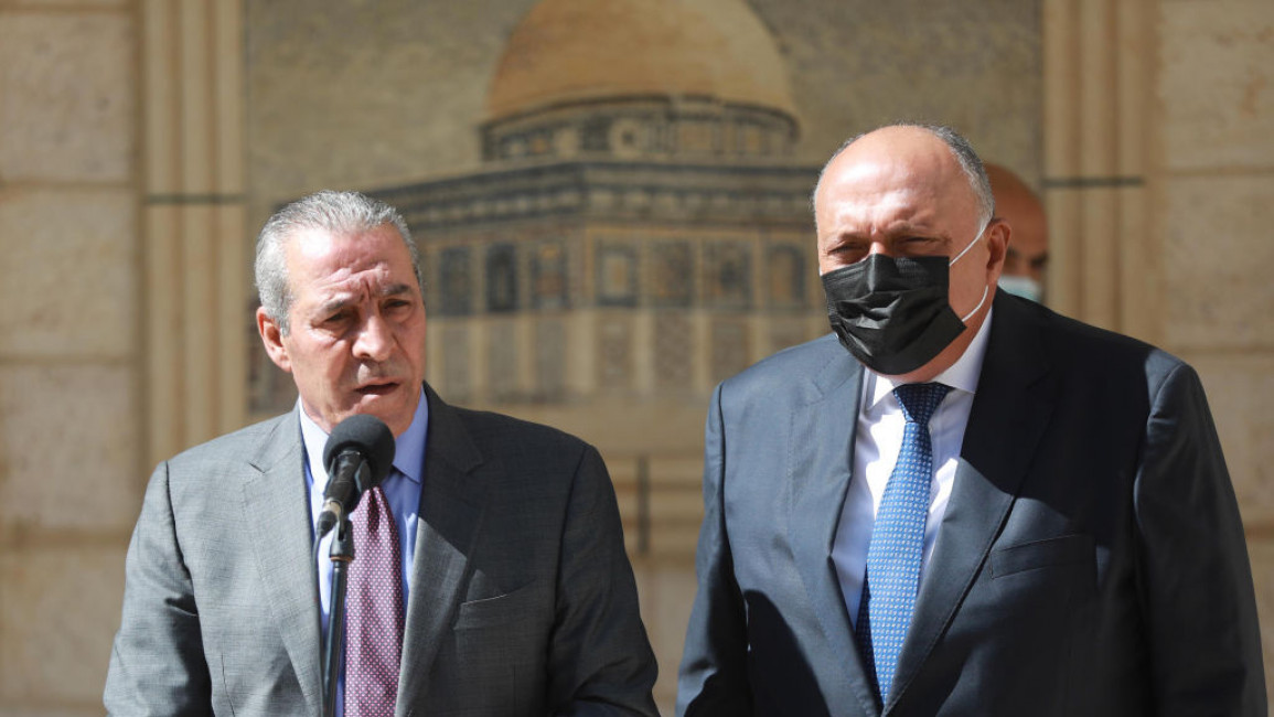 Hussein Al-Sheikh (left), Palestinian civil affairs minister and Palestine Liberation Organization Executive Committee secretary-general, with Egyptian Foreign Minister Sameh Shoukry (right).