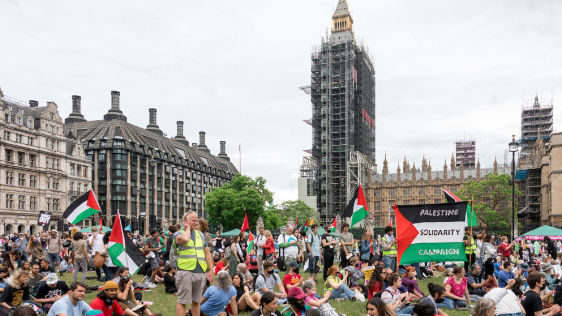Protesters gathering in Parliament Square, setting up various Palestinian flags during the demonstration. The Free Palestine rally was staged outside Parliament Square to express solidarity with Palestine, demanding immediate action from the part of the UK government to stop mass killings in Palestine