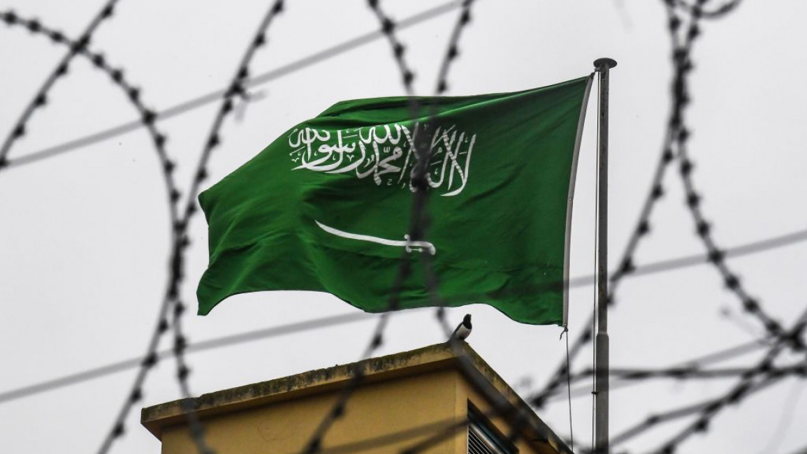 Saudi flag barbed wire