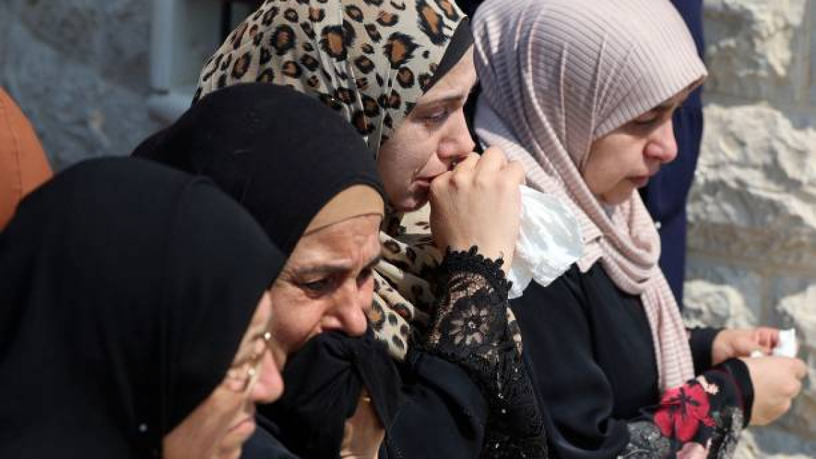 Palestinians mourning in Qabatiya / Getty