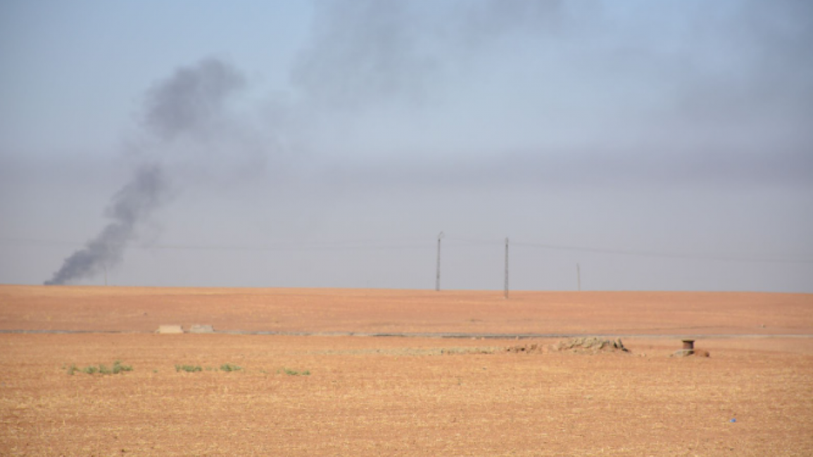 Smoke rising from local oil refineries, Northeast Syria [photo credit: Yiyao Yang]