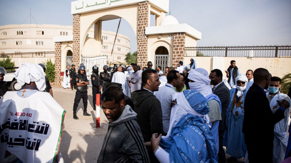 People gathered outside the courthouse where Ould Abdel Aziz was being tried [Getty]