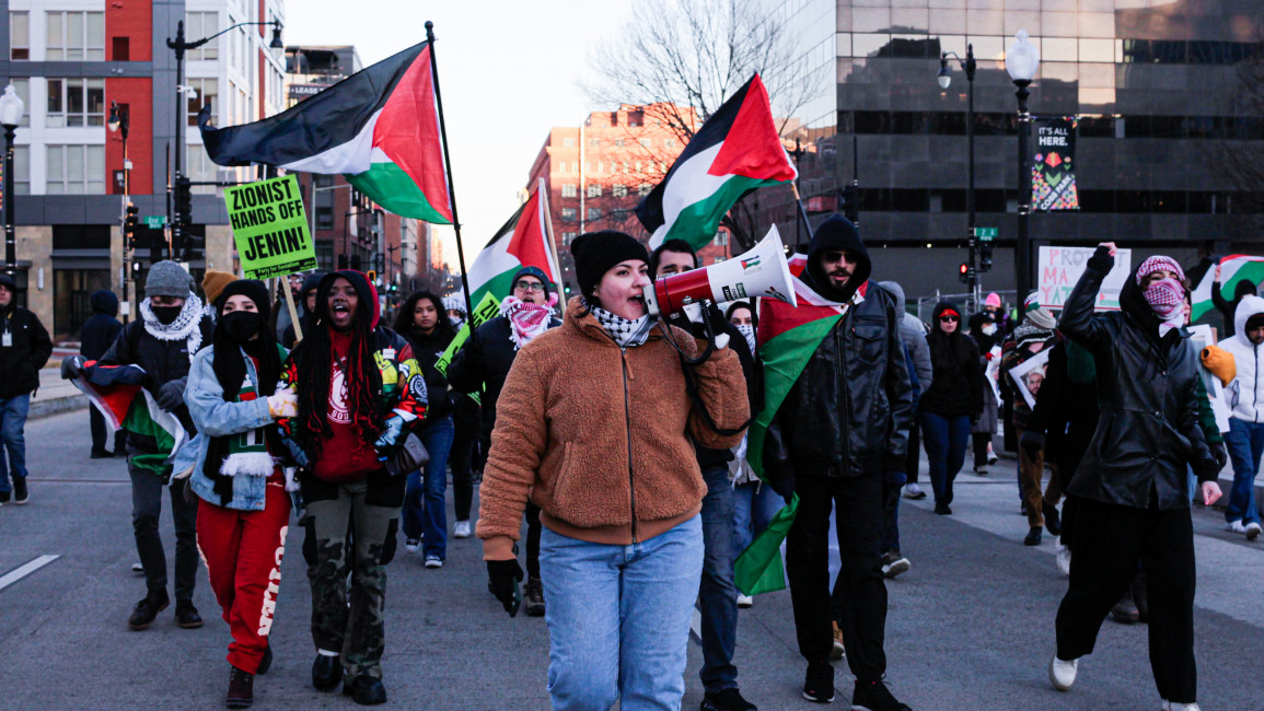 Demonstrators march in support of Palestinians in below-freezing weather in Washington on Friday. [Laura Albast/for The New Arab]