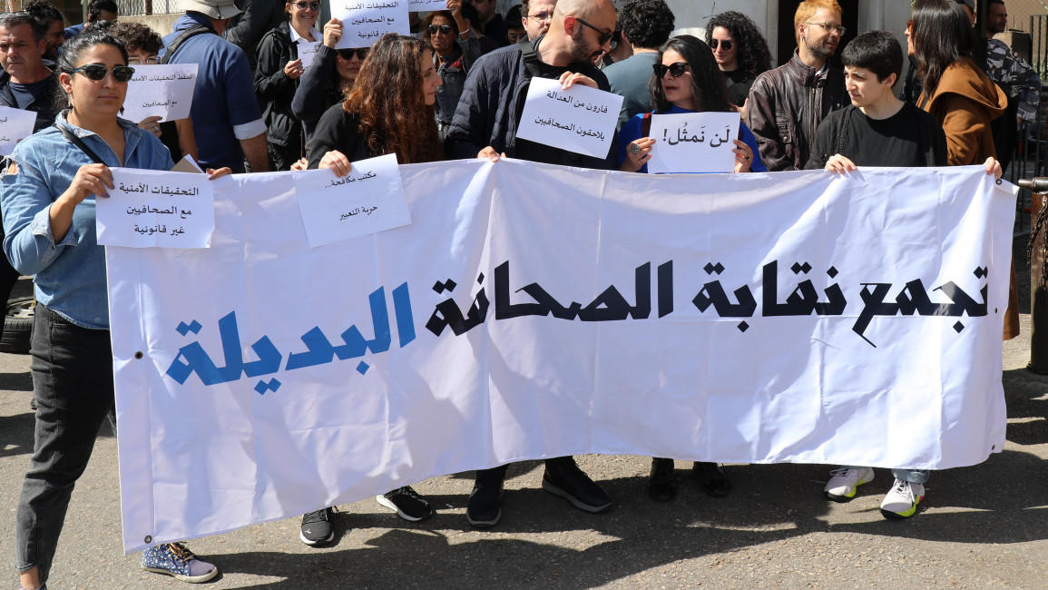 Protesters gather in solidarity with Lara Bitar, the editor-in-chief of The Public Source, who is facing a defamation charge filed by the Lebanese Forces in response to an article The Public Source wrote [William Christou - TNA].