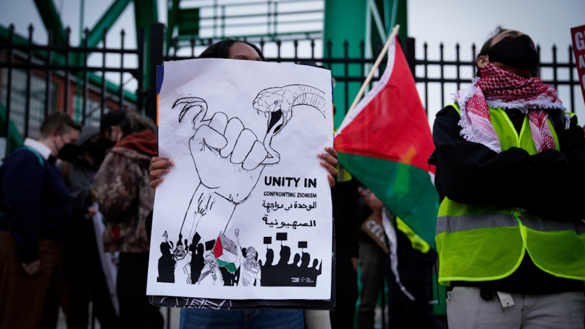 Pro-Palestinian activists stage protest at event in Baltimore. [Photo courtesy of Ryan Harvey/Rebel lens]