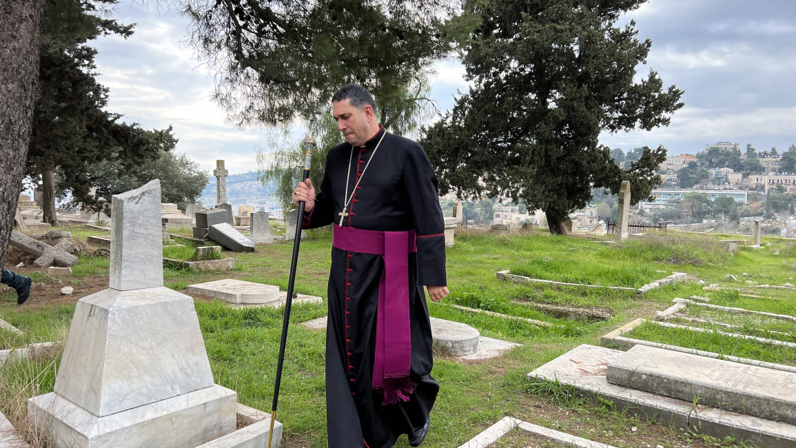 Bishop Husam Naoum at the Protestant cemetery. [Ibrahim Husseini/TNA]