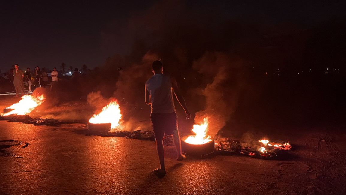 Group of people burn tires to protest Israeli meeting in Libya