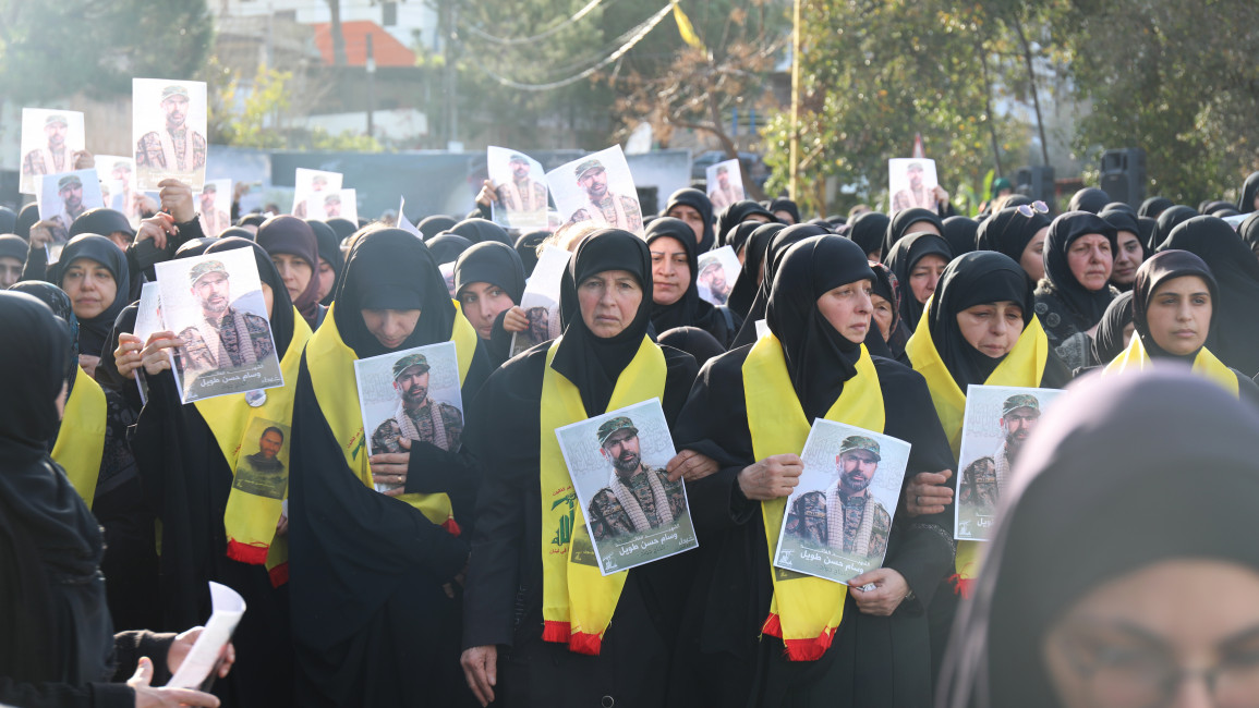Mourners attend the funeral of Wissam Tawil, a senior commander in Hezbollah's elite Radwan Forces, killed by an Israeli strike on 8 January. [William Christou - TNA]