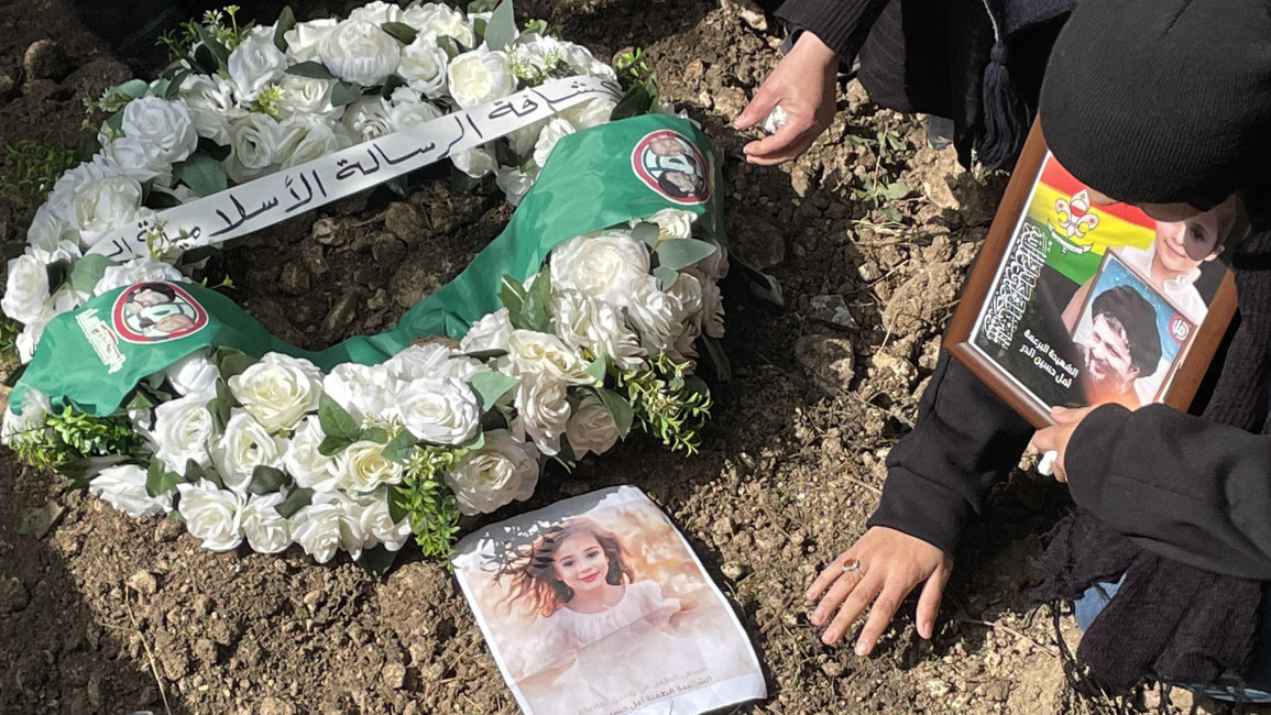 Amal al-Durr's relatives lament at her gravesite on Thursday, after the six-year old was killed by an Israeli strike the day prior. [William Christou - TNA] 