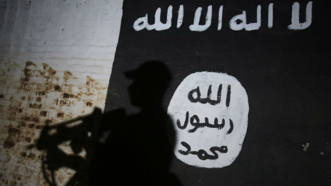 Islamic State  flag Mosul - AFP