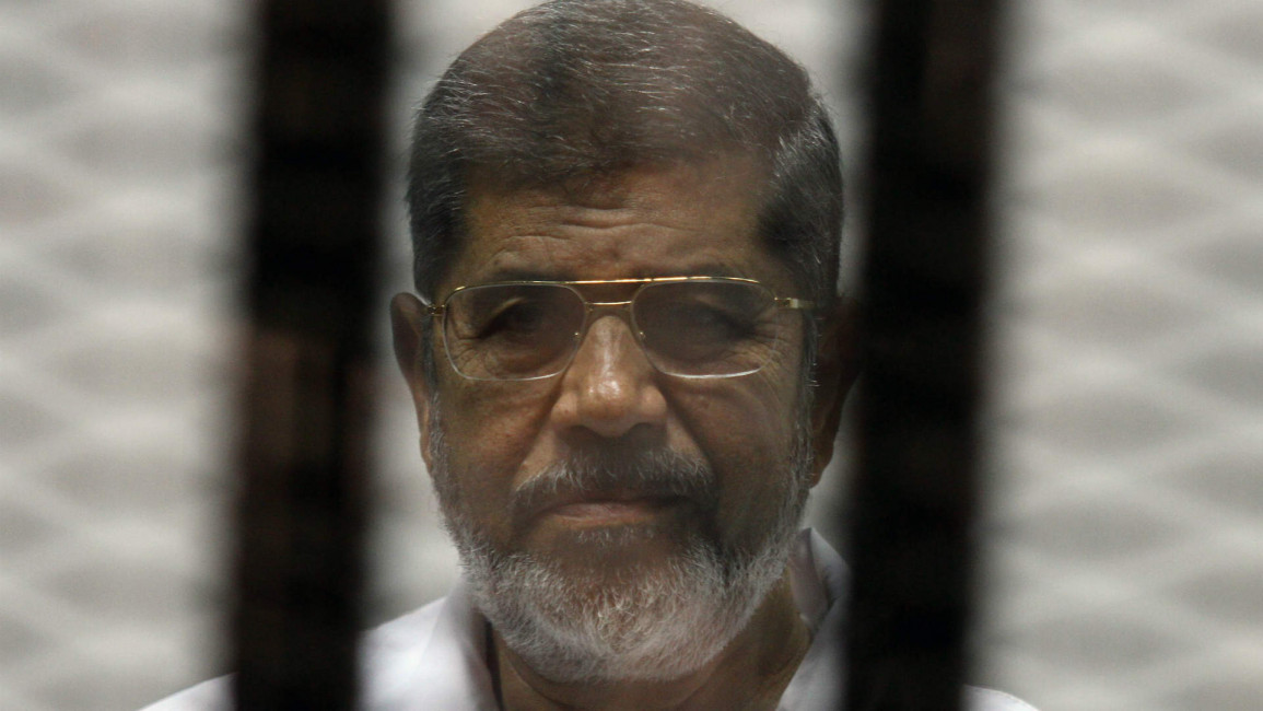Morsi behind bars