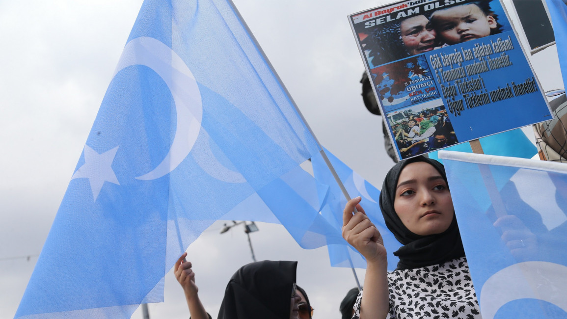 Uighurs protest against China's treatment of their community(Getty)