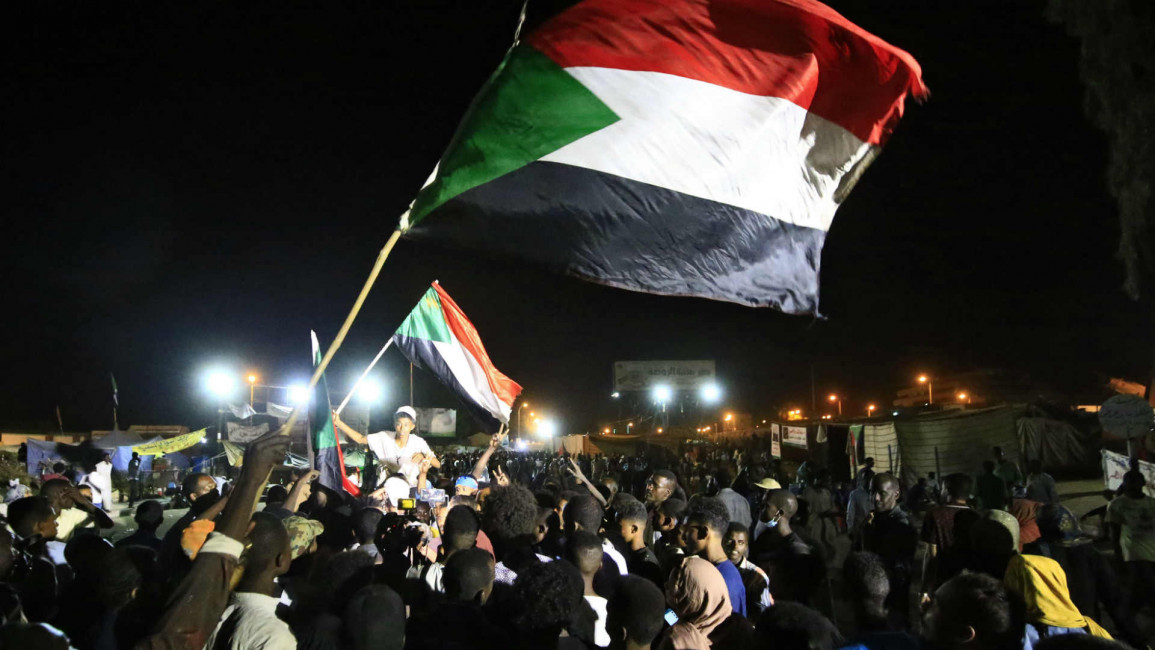sudan flag protest - afp