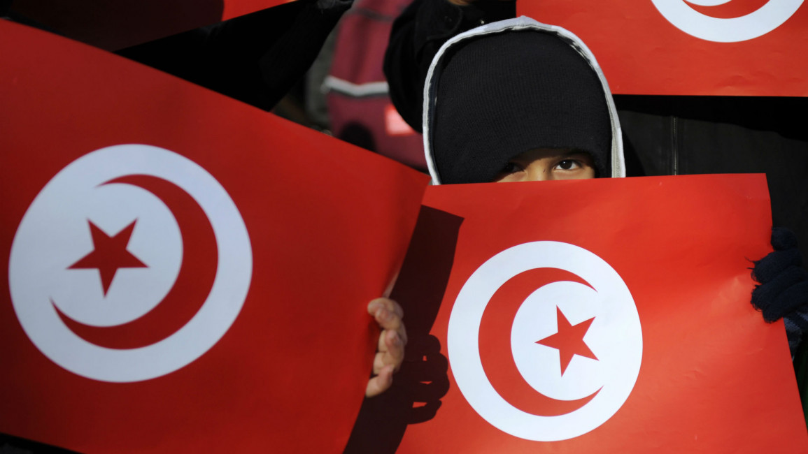 Tunisia flag children demonstration AFP