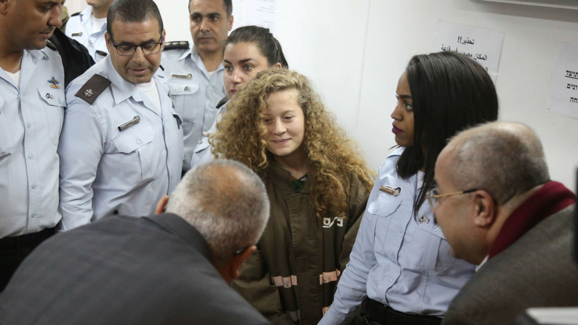 Ahed Tamimi resisting occupation through the years [Getty]