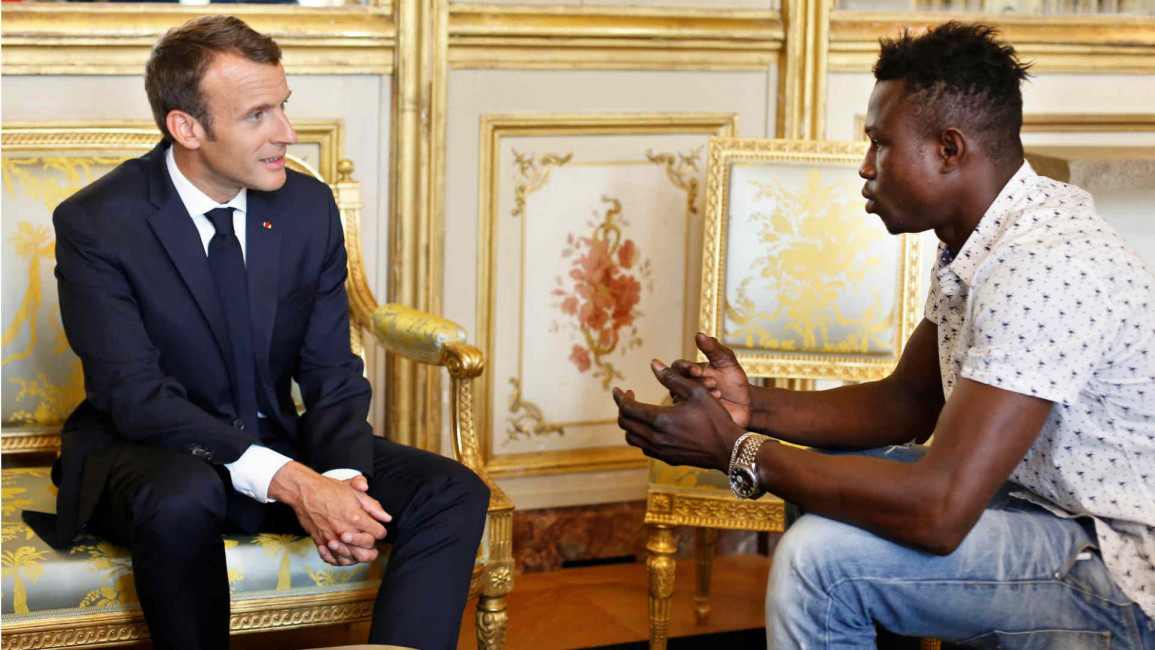 Macron with 'hero' migrant Mamoudou Gassama
