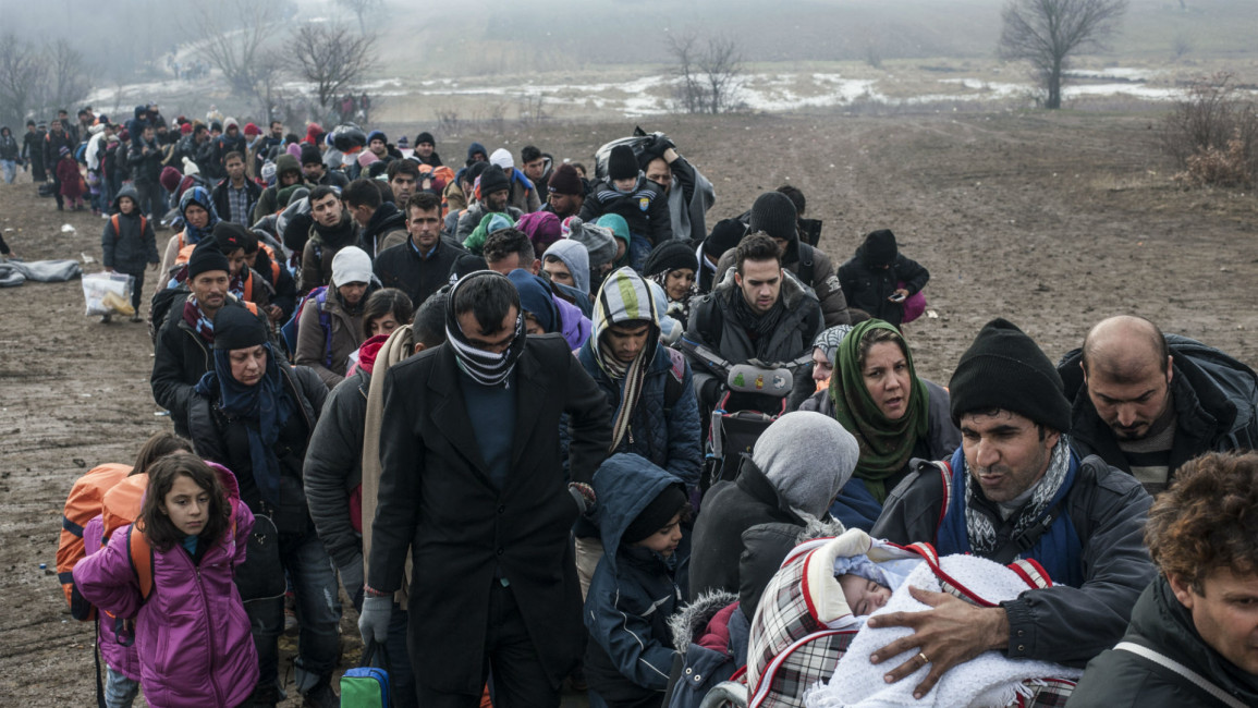 Refugees [AFP]