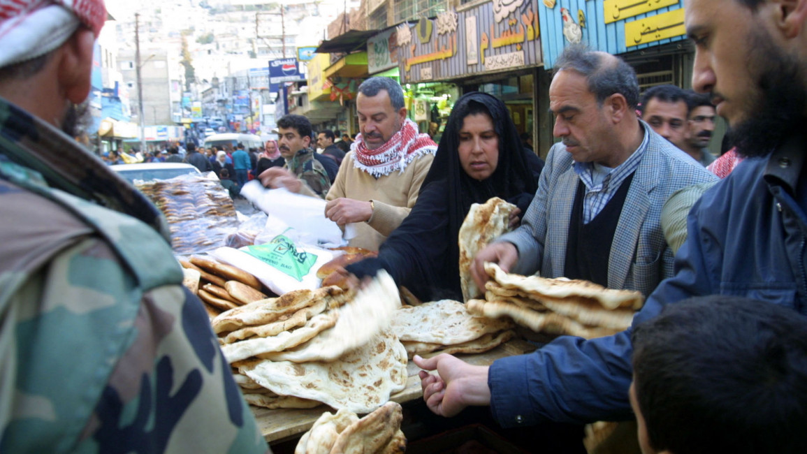 Jordanians bread market - Getty