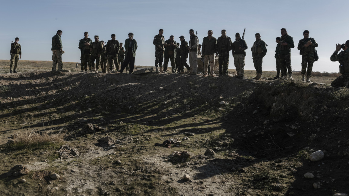 Mosul mass graves -- AFP