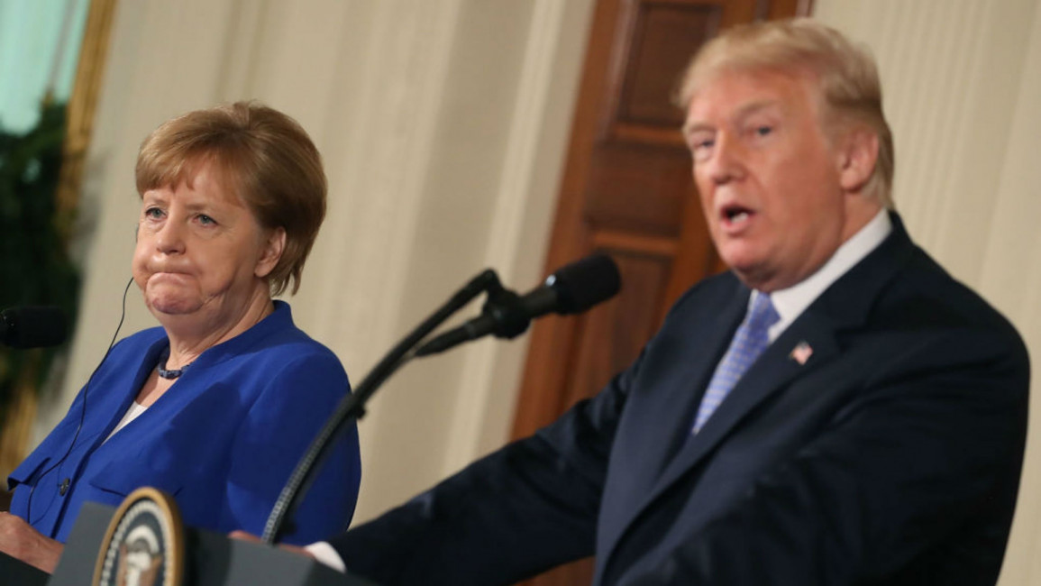 Trump Merkel - Getty