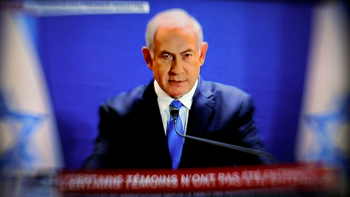 Binyamin Netanyahu on tv- AFP