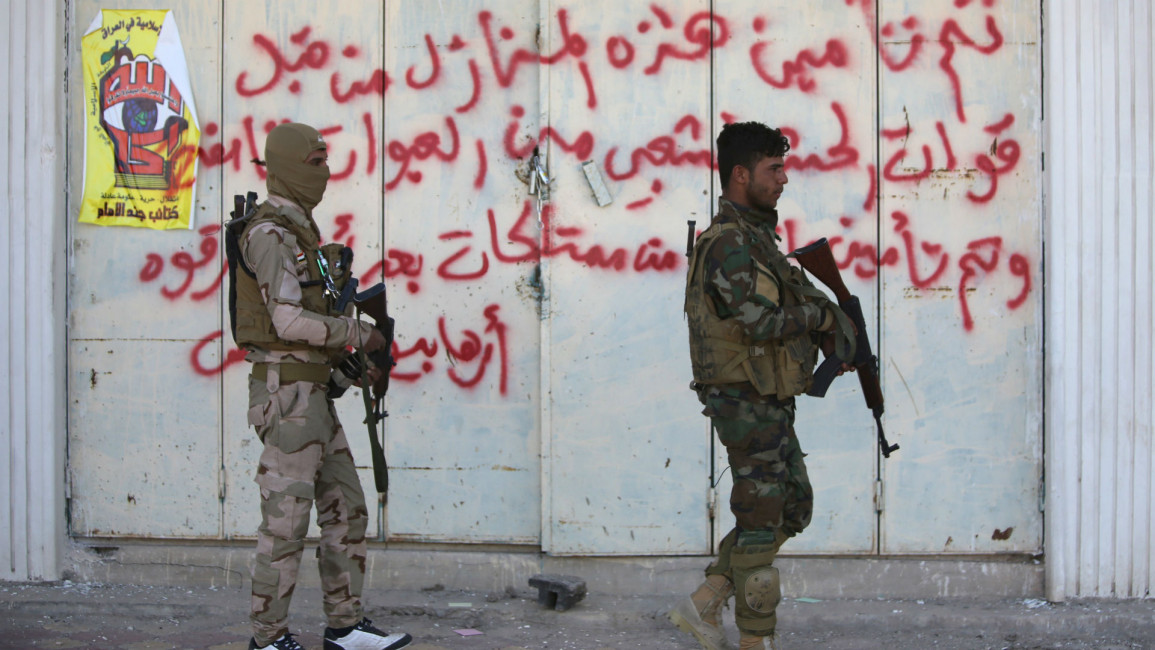 Shia fighters Tikrit AFP